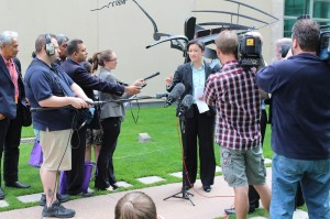 Election program participants join a press conference by Senator Penny Wong on election eve.